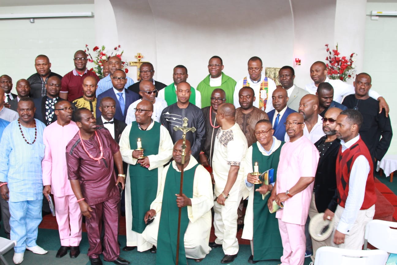 A cross section of members of the CMO pose with Fr Cornelius and other priests.